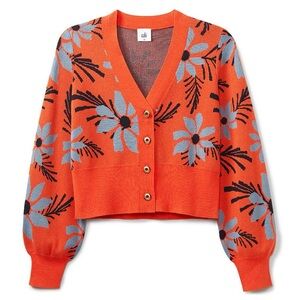 Add a pop of color to your wardrobe with this cardigan. An any season piece !